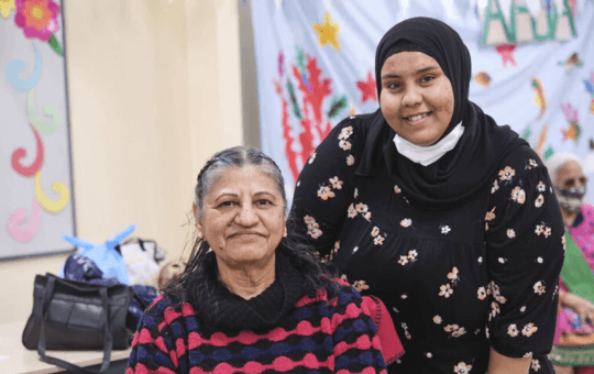 Two women smiling